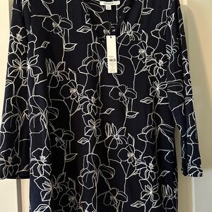 Chico's Elegant Black Top with White Floral Design